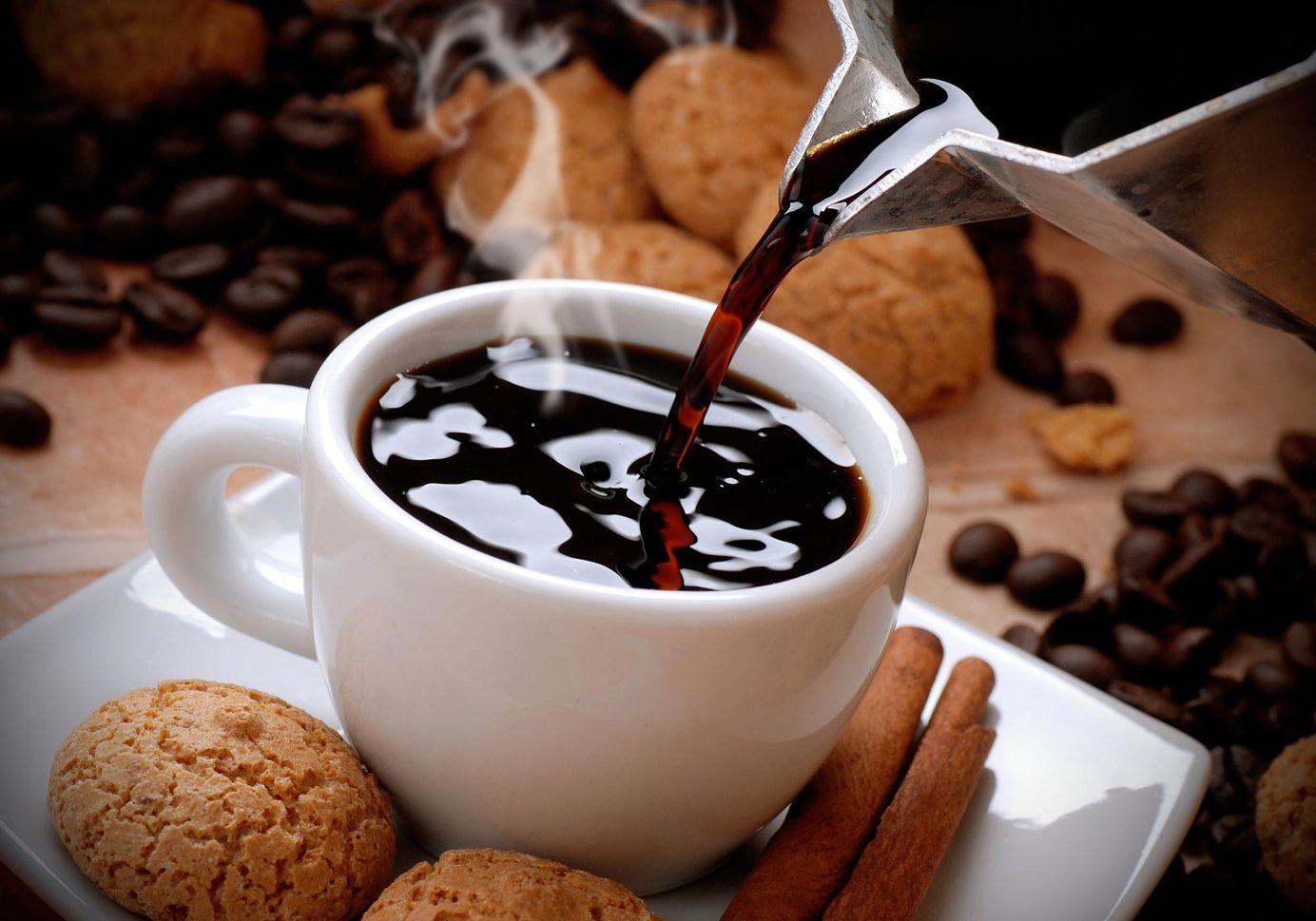 Pouring Cup Of Coffee مجلة نقطة العلمية