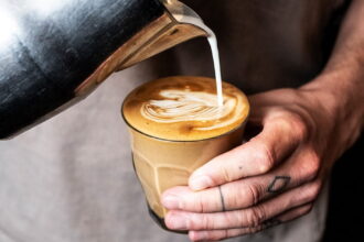 pouring coffee cappuccino 1200x628 Facebook 1200x628 1 ما هو الكافيين وهل هو جيد أم ضار بالصحة؟ مجلة نقطة العلمية