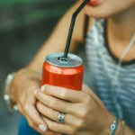 drinking soda 1 مشروبات مشهورة عليك تجنبها لتقليل مخاطر الإصابة بأمراض القلب مجلة نقطة العلمية